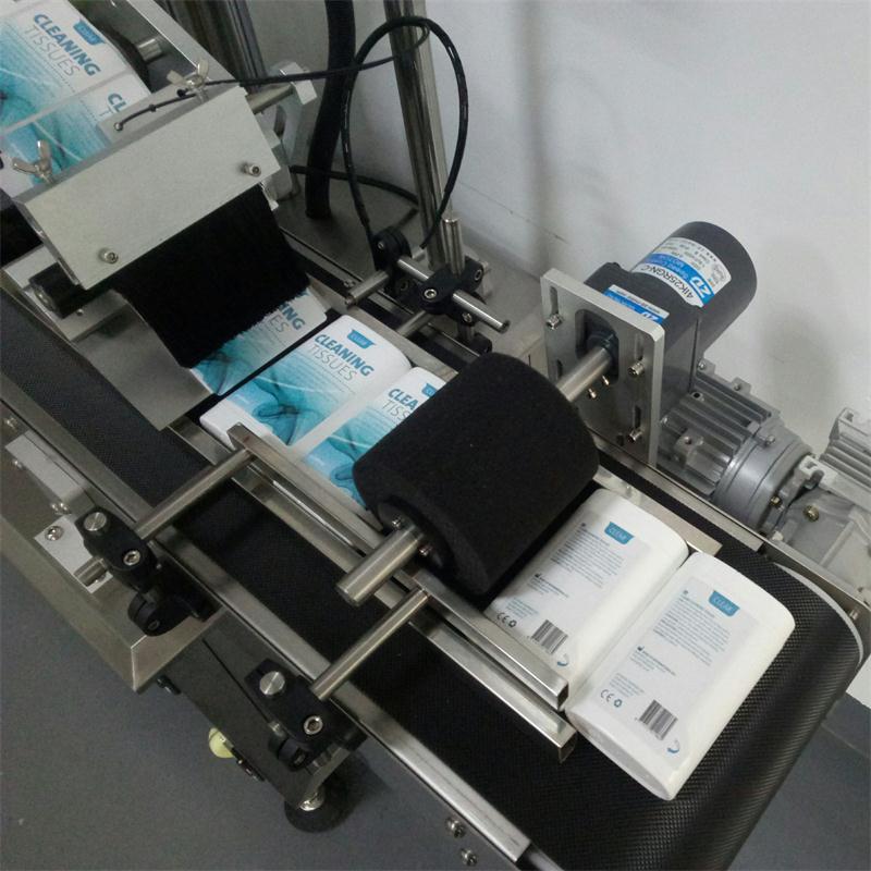 Automatic top labeling machine